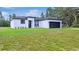 Beautiful single-story house with an attached two-car garage and manicured front yard at 16837 Sw 47Th Court Rd Rd, Ocala, FL 34473