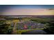 Aerial view of a beautiful Primary-planned community featuring lakes, green spaces, and well-maintained homes at 1809 Bluepoint St, St Cloud, FL 34771