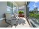 Enjoy a relaxing screened patio with comfortable seating and picturesque outdoor views at 1809 Bluepoint St, St Cloud, FL 34771