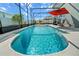 Relax and unwind in this sparkling screened-in pool area, perfect for entertaining or enjoying a peaceful swim at 1809 Bluepoint St, St Cloud, FL 34771