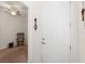 A welcoming foyer features neutral walls, carpet flooring, and a ceiling fan at 1825 Pelican Hill Way, Kissimmee, FL 34759