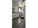 Bathroom with white vanity, tiled shower, and modern sliding glass door at 2049 Shannon Lakes Blvd, Kissimmee, FL 34743