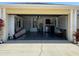 Open garage with washer, dryer, and plenty of space for storage and parking at 2049 Shannon Lakes Blvd, Kissimmee, FL 34743