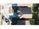 Aerial view of a beautiful house with paved driveway, two-car garage, green grass and trees at 2110 Korat Ln, Maitland, FL 32751