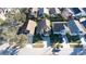 A lovely aerial shot of the home highlighting the manicured lawn and neighborhood at 2110 Korat Ln, Maitland, FL 32751