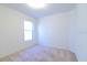 Carpeted bedroom filled with natural light from a window at 2110 Korat Ln, Maitland, FL 32751