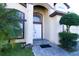 Charming front entrance with mature landscaping and inviting entryway at 2110 Korat Ln, Maitland, FL 32751