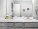Stylish bathroom featuring double sinks and modern fixtures at 2279 Raven Ridge Road, Minneola, FL 34715