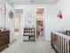 Clean Bedroom with closet, changing table and toy storage at 2279 Raven Ridge Road, Minneola, FL 34715