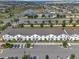 Scenic aerial view of the townhome complex showing the community layout and surrounding landscape at 2408 Dubai St, Kissimmee, FL 34747