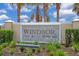 Windsor at Westside community sign surrounded by lush greenery at 2408 Dubai St, Kissimmee, FL 34747