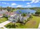 Aerial view of beautiful home, with a large lake in the backyard, and screened enclosure at 3037 Diamond Ln, St Cloud, FL 34772