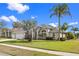 Beautiful home featuring a well-maintained lawn with lush landscaping at 3037 Diamond Ln, St Cloud, FL 34772