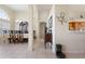 Open-concept hallway leading to the dining room and kitchen at 3037 Diamond Ln, St Cloud, FL 34772