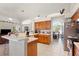 Bright kitchen features tile floors, wood cabinets, white countertops, and stainless steel appliances at 3037 Diamond Ln, St Cloud, FL 34772