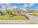 Beautiful single-Gathering home with a landscaped front yard and an attached three-car garage at 3191 Marshfield Preserve Way, Kissimmee, FL 34746