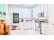 Clean kitchen with white cabinets, stainless appliances, and ample counter space at 3191 Marshfield Preserve Way, Kissimmee, FL 34746