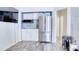 Kitchenette with stainless steel refrigerator and white cabinets at 3191 Marshfield Preserve Way, Kissimmee, FL 34746