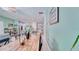 Bright, open living area with dining table, decorations, and natural light, ideal for entertaining at 3191 Marshfield Preserve Way, Kissimmee, FL 34746