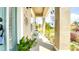 Inviting porch with outdoor seating, perfect for relaxing and enjoying the neighborhood view at 3191 Marshfield Preserve Way, Kissimmee, FL 34746