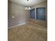 Charming dining room with neutral paint, tile floors, modern light fixture and window niches at 3321 Whitestone Cir # 204, Kissimmee, FL 34741