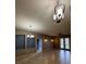 Open floor plan of a living room with tile floors, ceiling fans and neutral walls at 3321 Whitestone Cir # 204, Kissimmee, FL 34741