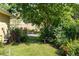 Tranquil backyard with mature trees and manicured landscaping, creating a serene outdoor oasis at 3535 Clay Brick Rd, Harmony, FL 34773