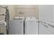 Well-equipped laundry room featuring modern washer and dryer units, ensuring convenience for laundry tasks at 3535 Clay Brick Rd, Harmony, FL 34773