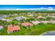 Community view of homes surrounding a serene lake, showcasing the neighborhood's idyllic setting and natural beauty at 4117 Navigator Way, Kissimmee, FL 34746