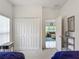 Comfortable bedroom with access to living room at 4117 Navigator Way, Kissimmee, FL 34746