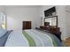 Bedroom offers a tv, dresser, and neutral paint, creating a relaxing retreat at 4611 Eaglet Ln, Kissimmee, FL 34746