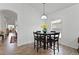 Cozy breakfast nook area with dark wood table set at 4611 Eaglet Ln, Kissimmee, FL 34746