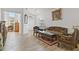 Bright living room with carved wood furniture and tile floors at 4611 Eaglet Ln, Kissimmee, FL 34746