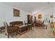 Formal living and dining area with detailed furniture and ceramic tile floor at 4611 Eaglet Ln, Kissimmee, FL 34746