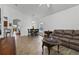Open concept living room with adjacent breakfast nook at 4611 Eaglet Ln, Kissimmee, FL 34746