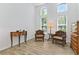 Bright sitting room with high ceilings and plenty of natural light from large windows at 4611 Eaglet Ln, Kissimmee, FL 34746