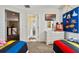Spacious bedroom with bright paint, and closet and bathroom entrances at 615 Copeland Dr, Haines City, FL 33844