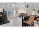 Modern kitchen featuring granite countertops, stainless steel appliances, and an eat-in bar at 615 Copeland Dr, Haines City, FL 33844