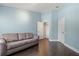 Bedroom featuring hardwood flooring, a neutral color, and natural light at 6873 Slaven Dr, Orlando, FL 32819