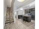Modern kitchen with granite countertops, stainless steel appliances, and stylish island seating at 6873 Slaven Dr, Orlando, FL 32819