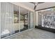 The screened porch is accessible through sliding glass doors, offering a great view at 6873 Slaven Dr, Orlando, FL 32819