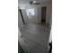 Bedroom with neutral colored walls, luxury vinyl plank flooring, and two closets at 7341 Daniel Webster Dr # 4, Winter Park, FL 32792
