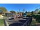 Fun-filled playground with a slide and climbing structure, perfect for children in a secure environment at 7422 Sparkling Ct, Reunion, FL 34747