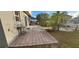 Backyard patio with a table next to the house at 773 Leopard Ct, Kissimmee, FL 34759