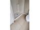Bathroom featuring a standing shower with a standard toilet at 773 Leopard Ct, Kissimmee, FL 34759