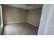 Bedroom featuring tile floors, neutral walls, and a ceiling fan, providing a blank canvas for personalization at 773 Leopard Ct, Kissimmee, FL 34759