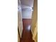 A bedroom with hardwood floors, a ceiling fan, and a wall anchor at 773 Leopard Ct, Kissimmee, FL 34759