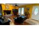 Comfortable living room with cozy fireplace and natural light at 805 Hemlock Dr, Apopka, FL 32712