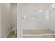 The bathroom features a large walk-in glass shower and a toilet at 8724 Peachtree Park Ct, Windermere, FL 34786