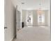 Light and spacious bedroom with ample natural light and a view to the en-suite bath at 8724 Peachtree Park Ct, Windermere, FL 34786